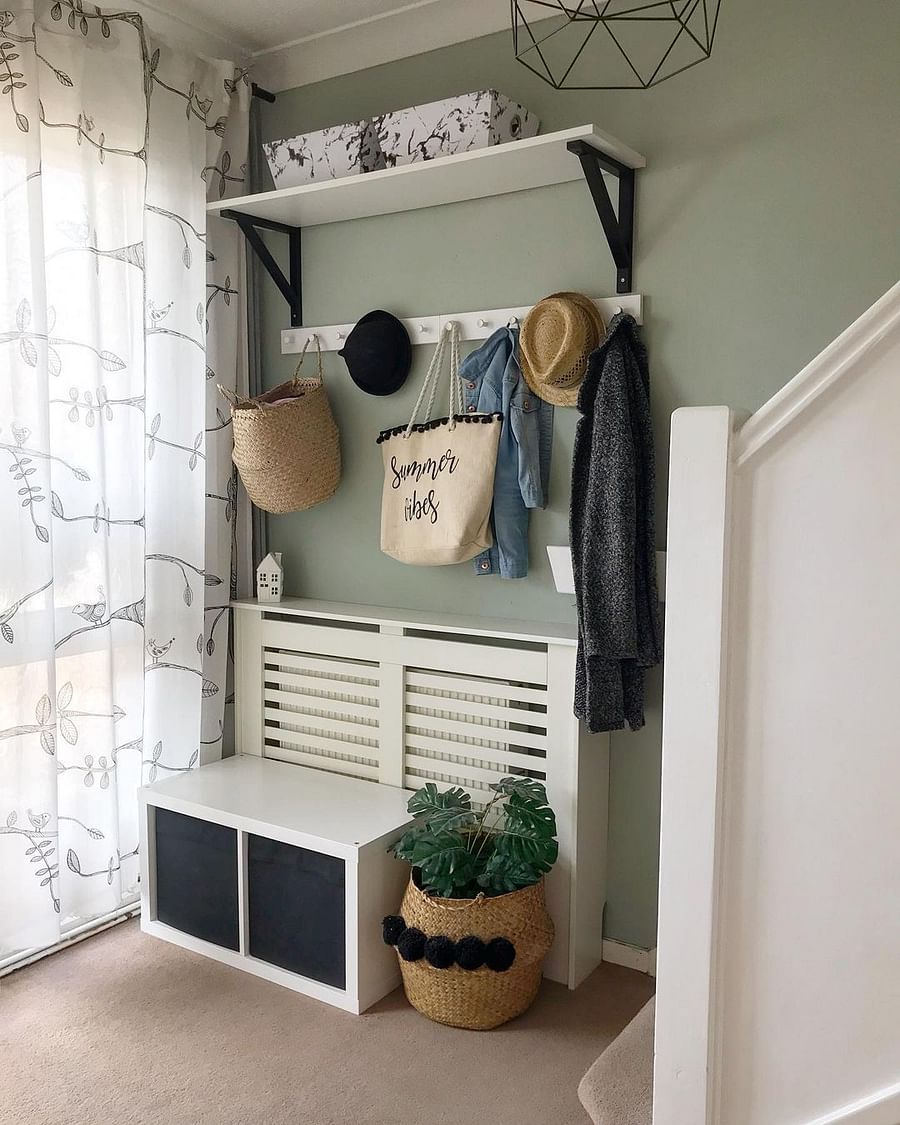 diy faux mudroom using ikea products set up by the front door